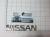 Эмблема шильдик Nissan на багажник маленькая 122 х 22 мм